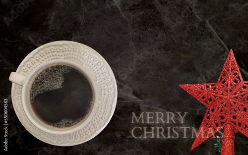 coffee with white cup with dark background written 2023, happy new year 2023, with message from merry christmas