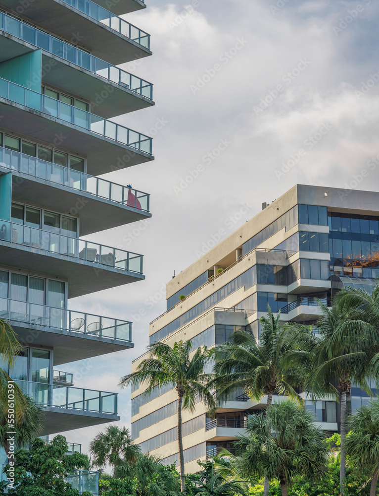 Condominium and corporate building against the sky background in Miami, FL