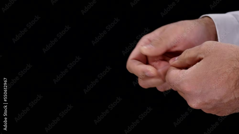 Close up faceless man counting money when another man hand grabs it, Concept of robbery, 4k footage isolated on black background Close up faceless man counting money when another man hand grabs it, Concept of robbery, 4k footage isolated on black background