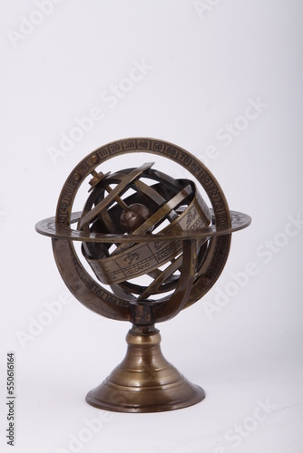 Spherical bronze astrolabe used for astrology photo