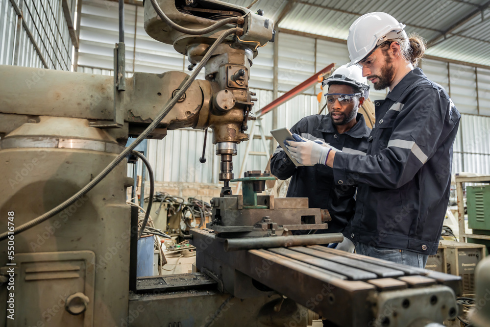 Team of engineers practicing maintenance Taking care and practicing maintenance of old machines in the factory so that they can be used continuously. Team of engineers practicing maintenance Taking care and practicing maintenance of old machines in the factory so that they can be used continuously.