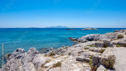 View over wide blue ocean from a rocky coastline