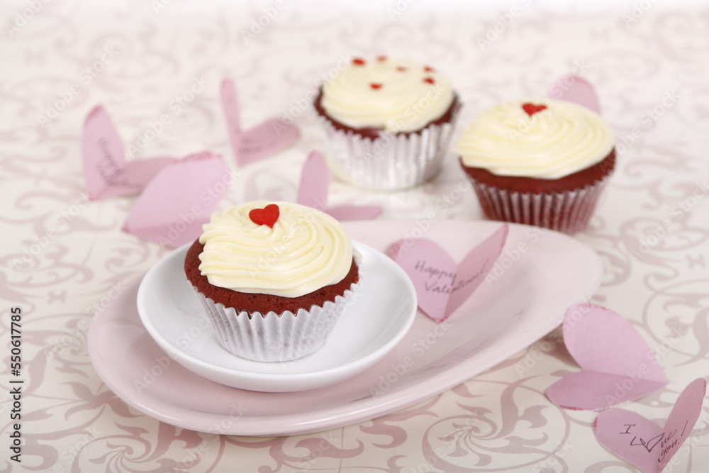 Red velvet cupcakes with hearts for Valentine's Day