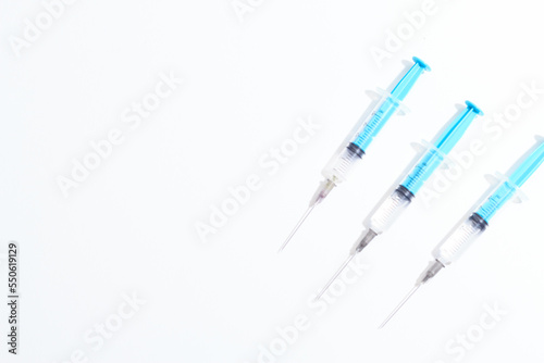 Disposable plastic syringe prepared for injection and vaccination in the hospital. The concept of medicine and health