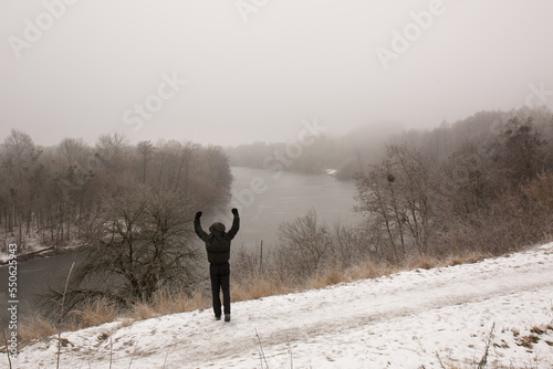 A man with outstretched arms