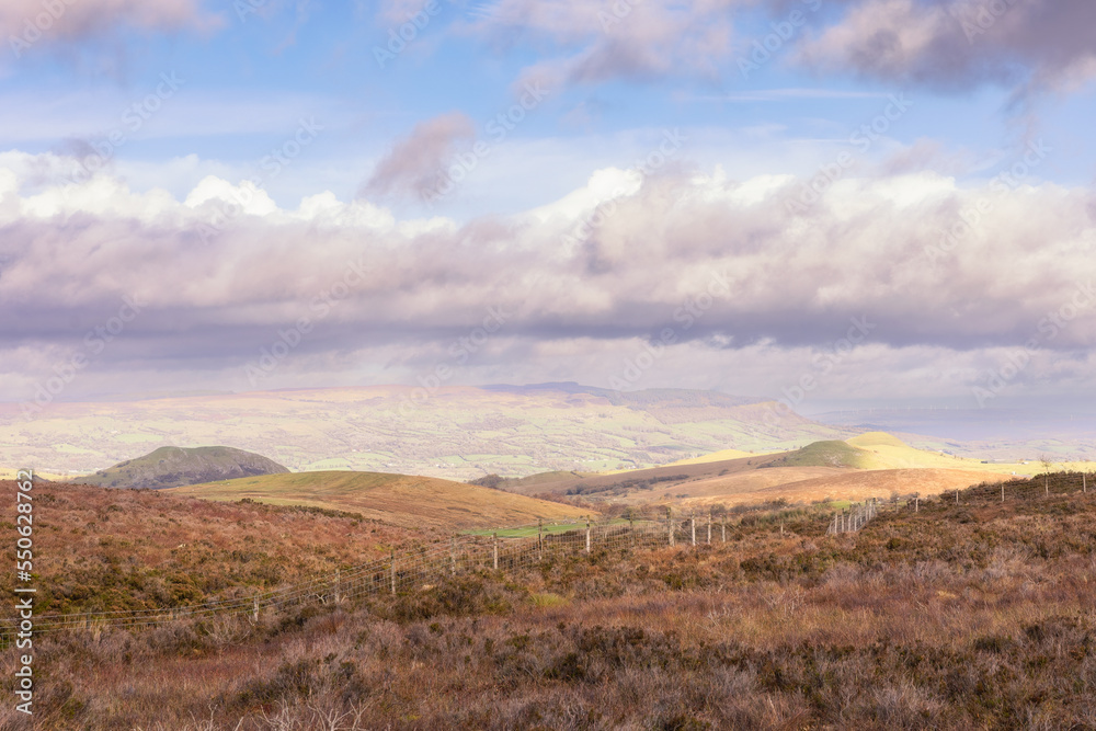 Dramatic sky over rolling hills of a countryside. Fermanagh, Northern Ireland. 