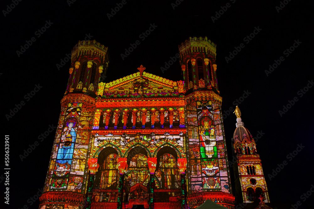 Marvellous facade of the Basilica of Fourvière in Lyon on which multicoloured images are projected on the occasion of the traditional annual festival of lights