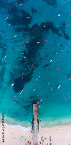 aeerial shot of boats on tropical waters in cape verde, sal island
