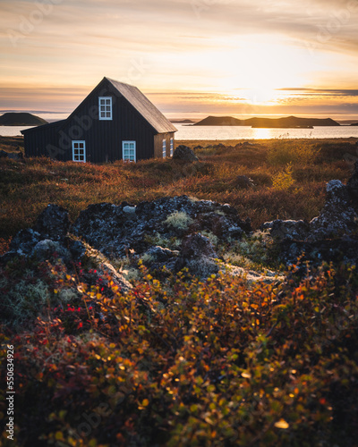 Cozy cottage in Iceland in september during sunset by myvatn lake