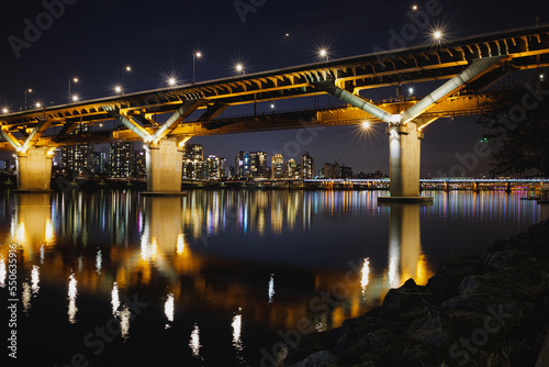 Night view of Han River in Seoul, Cheongdam Bridge and lights reflected in the calm Han River