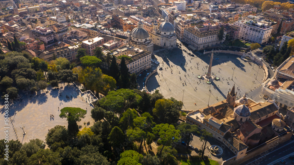 Aerial view of Piazza del Popolo, a large urban square, near the Villa Borghese gardens and the Pincio terrace in Rome, Italy. In the square there is the Flaminio Obelisk known as Popolo Obelisk.