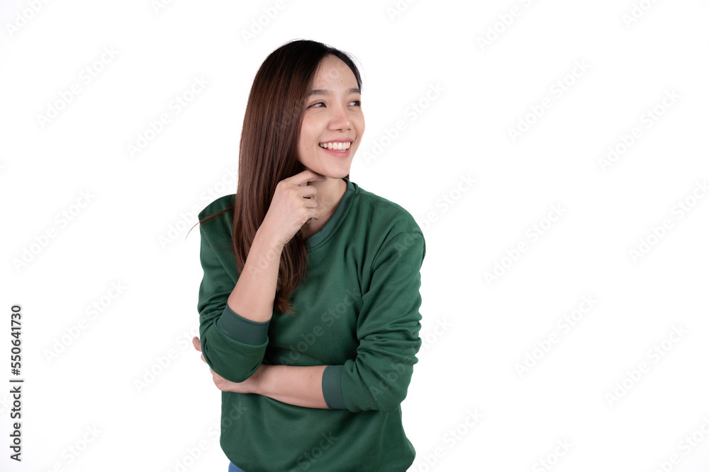 Young beautiful smiling good mood positive girl pointing finger in copyspace isolated on white background. Young beautiful smiling good mood positive girl pointing finger in copyspace isolated on white background.