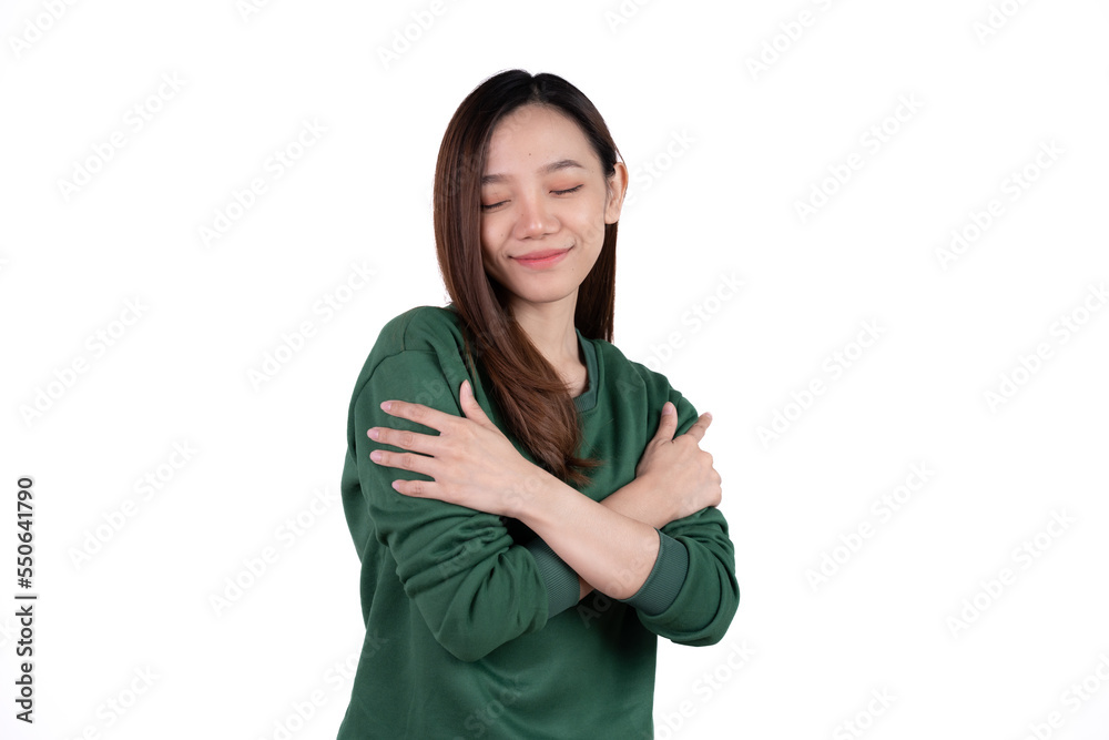 Young business woman hugs herself, smiling carefree and happy isolated on white background. Young business woman hugs herself, smiling carefree and happy isolated on white background.