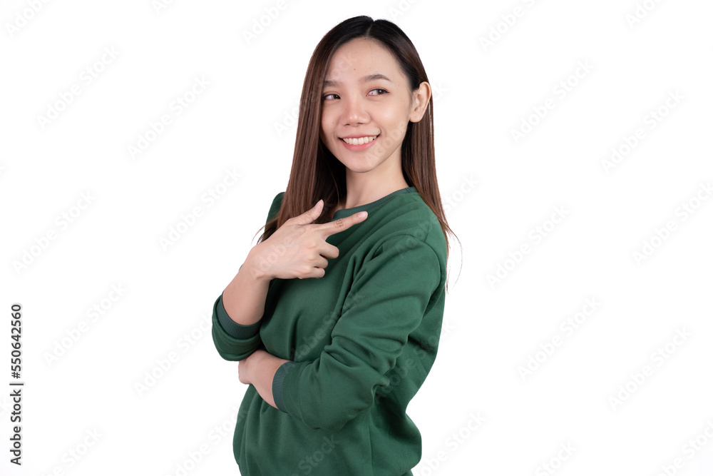 Young beautiful smiling good mood positive girl pointing finger in copyspace isolated on white background. Young beautiful smiling good mood positive girl pointing finger in copyspace isolated on white background.