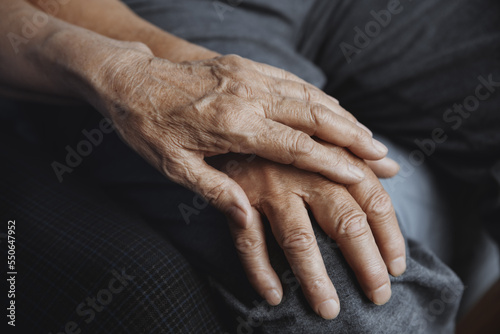 Wallpaper Mural Anonymous senior man emotionally supporting and comforting his senior wife while holding her hands Torontodigital.ca