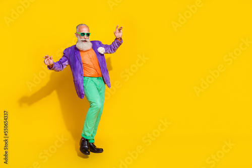Full size photo of handsome grandpa dancing elegant bachelorette party wear trendy colorful garment isolated on yellow color background