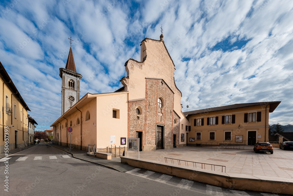 Obraz premium Borgo San Dalamazzo, Cuneo, Italy- December 01, 2022: The parish church of the ancient abbey of San Dalmazzo di Pedona in the town of the cold fair