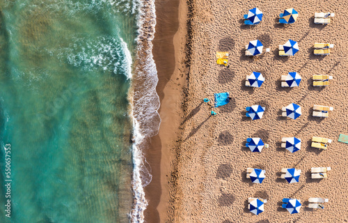 Aerial drone view over western coast and Glyfada beach, Island of Corfu, Greece. Glyfada Beach at Corfu Greece during the day. photo