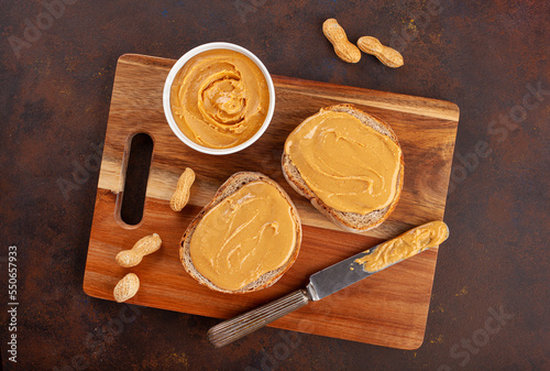 Obraz na płótnie smooth peanut butter bread toast, healthy traditional sandwich w salonie