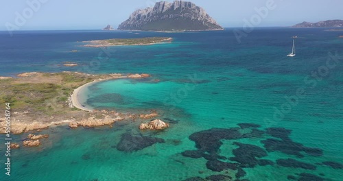 Wallpaper Mural Aerial view of the steep limestone and granite cliffs of Tavolara Island surrounded by a clear and turquoise sea in Sardinia, Italy. Torontodigital.ca