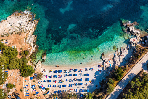 Aerial drone view north east coast with Kanoni, Mpataria and Pipitos beach, Island of Corfu, Greece. Mpataria, Kanoni and Pipitos beach at Corfu Greece during the day. photo