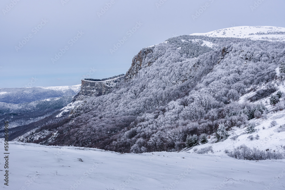 View on the top of Mount Alenga. Southern Demerdzhi in snow and ice in spring. Crimea