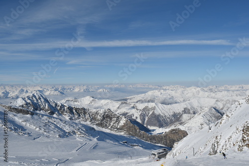 Sunny day on a Hintertux glacier (photo taken from 3250 meters above sea level) with view of Tirol Alps © Eyo