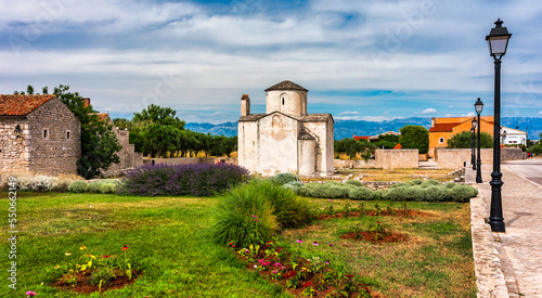 Fototapeta Naklejka Na Ścianę i Meble -  Nin town and Church of the Holy Cross is a Croatian Pre-Romanesque Catholic church originating from the 9th century in Nin, Croatia