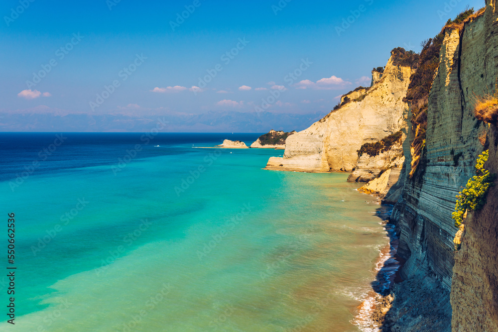Beautiful view of Cape Drastis in the island of Corfu in Greece. Cape Drastis, the impressive formations of the ground, rocks and the blue waters panorama, Cape Drastis, Corfu, Greece, Ionian Islands.