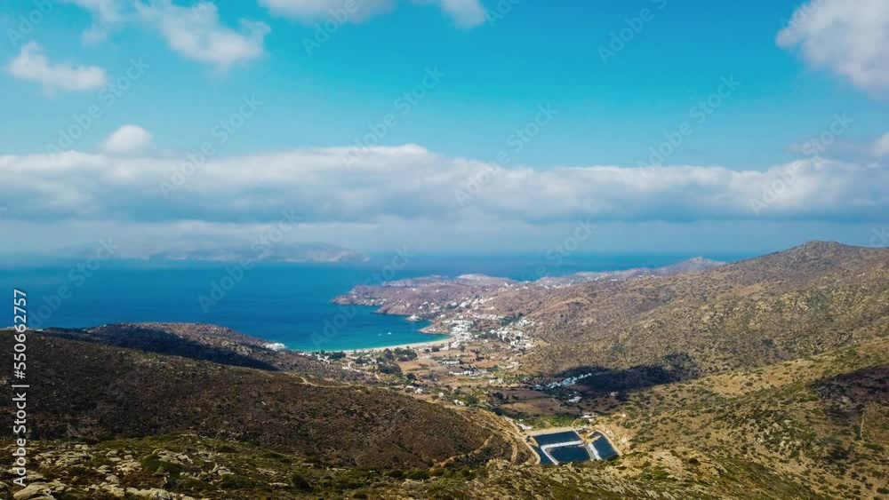 View of the Ios island. Chora old town in the background. Panoramic view of coastline, mountain around. Cyclades, Greece. View of the Ios island. Chora old town in the background. Panoramic view of coastline, mountain around. Cyclades, Greece.