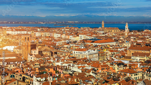 Venice panoramic aerial view with red roofs, Veneto, Italy. Aerial view of the Venice city, Italy. Venice is a popular tourist destination of Europe. Venice, Italy.