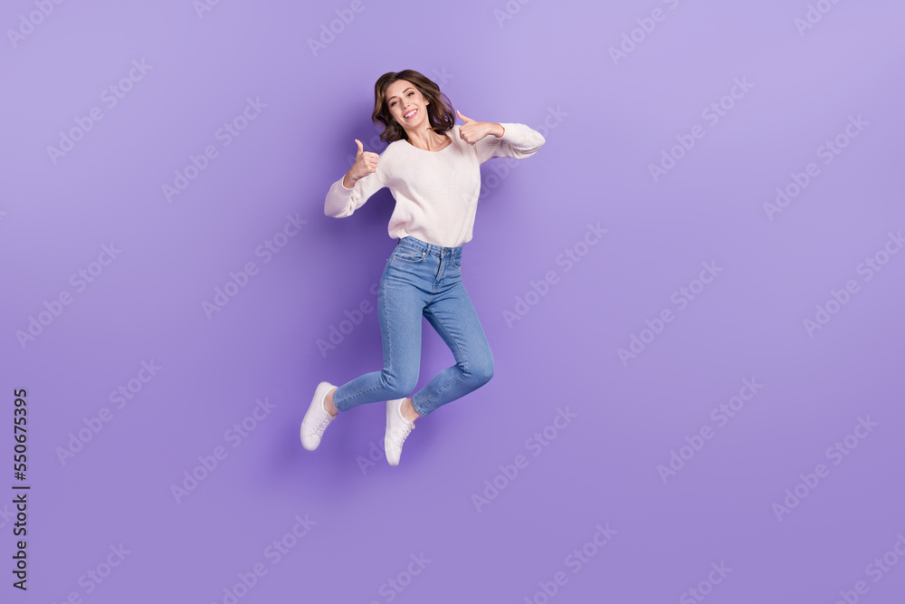 Full length photo of positive lady rejoice black friday total sale thumb up cool offer empty space isolated on purple color background