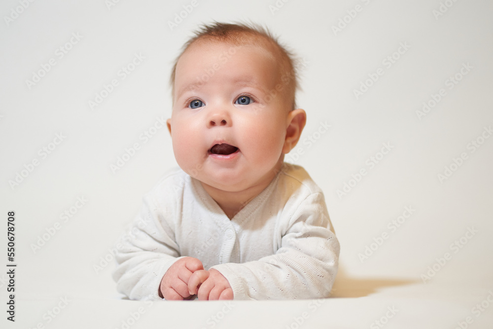 portrait of an infant on a white background portrait of an infant on a white background