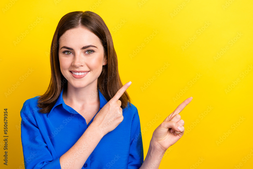 Photo of lovely cheerful lady wear stylish clothes demonstrate blank space visit new boutique low price isolated on yellow color background Photo of lovely cheerful lady wear stylish clothes demonstrate blank space visit new boutique low price isolated on yellow color background