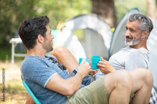 two men enjoying in the camping © auremar