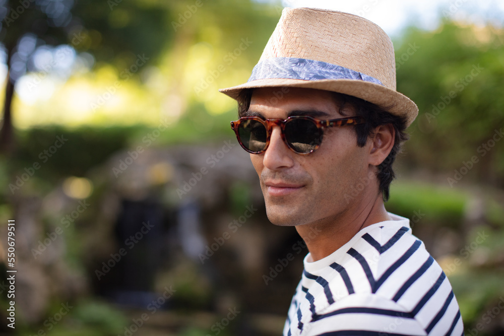 portrait of young handsome man smiling outdoor