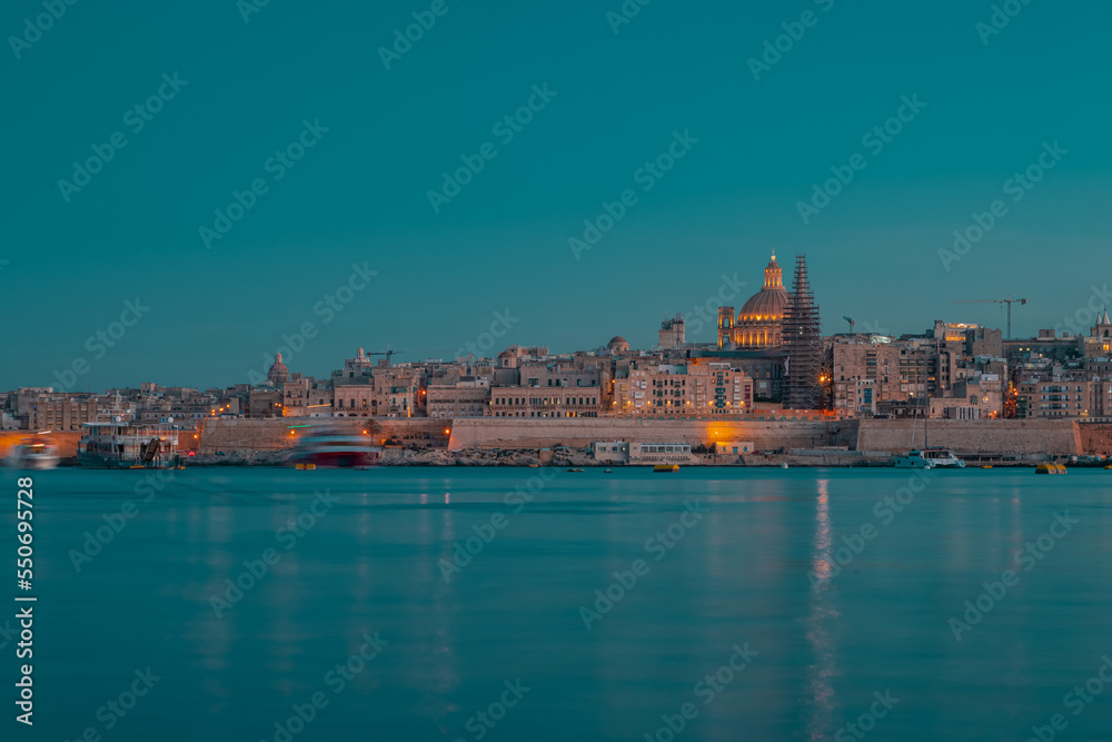 Cityscape of Valletta, Malta on an autumn evening in golden hour
