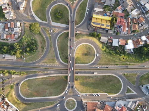 Vehicles circulating on the interchange and road in the city of Telêmaco Borba photo