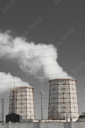 The work of an industrial enterprise or a thermal power plant. Smoke is released into the air and atmosphere and pollution of the surrounding environment of ecology
