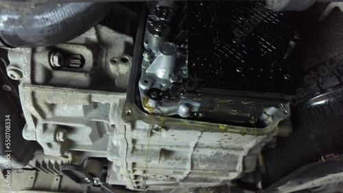 oil leaks from the gearbox oil change in the gearbox car service breakdown. High quality 4k footage
