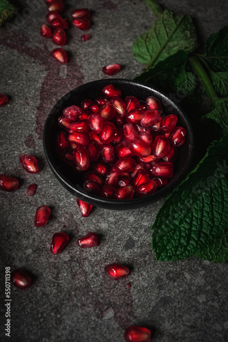 pomegranate seeds in a bowl