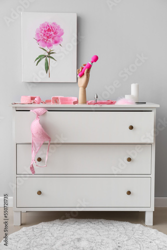 Wooden hand with pink sex t...
