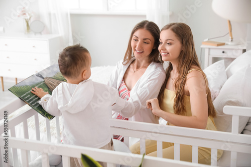 Happy lesbian couple and th...