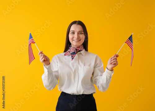 Young woman with USA flags ...