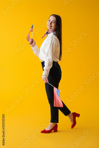 Young woman with USA flags ...