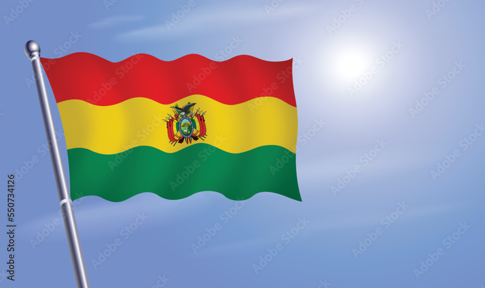Naklejka premium Bolivia flag against a blue sky