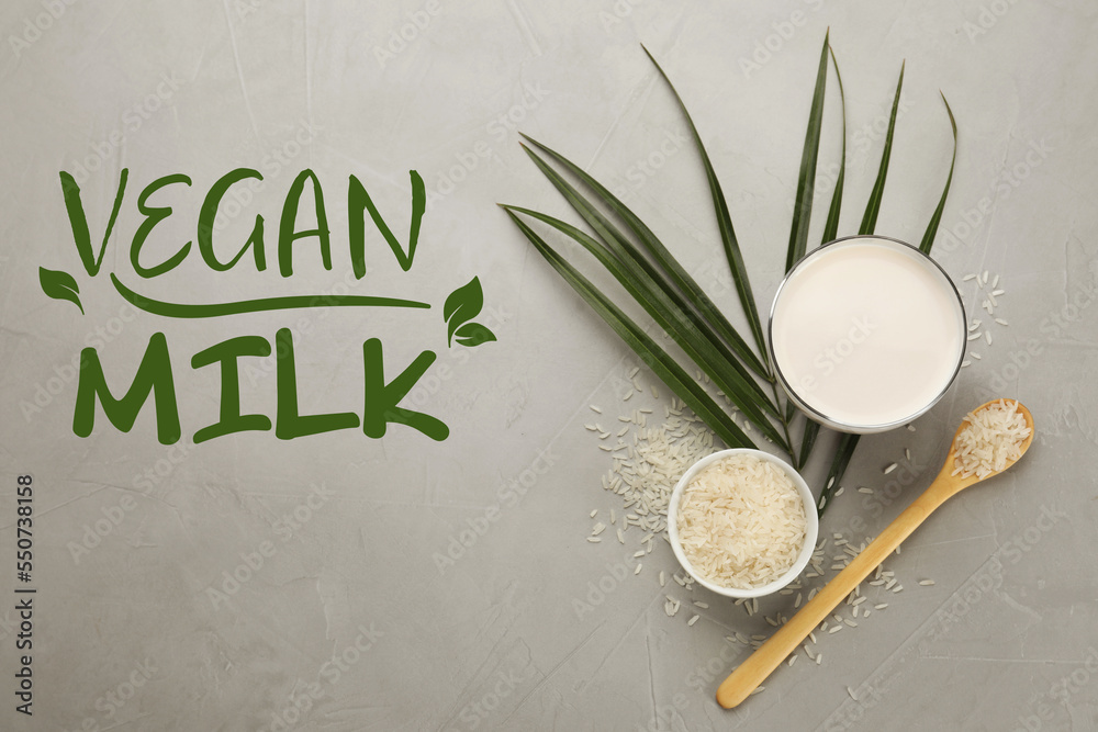 Fototapeta premium Delicious vegan rice milk and grains on light grey table, flat lay