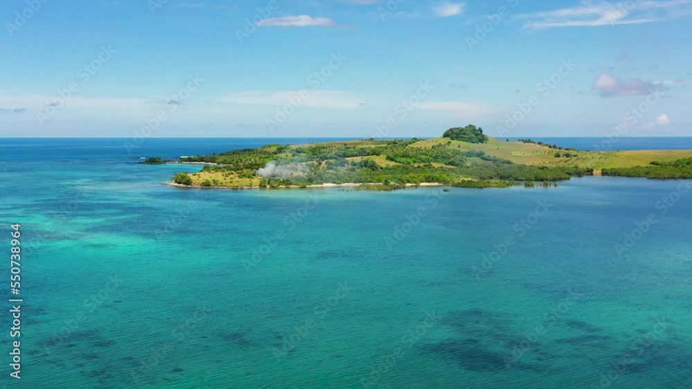 Basot Island, Caramoan , Philippines.Tropical island with green hills, aerial drone. Summer and travel vacation concept. Basot Island, Caramoan , Philippines.Tropical island with green hills, aerial drone. Summer and travel vacation concept.