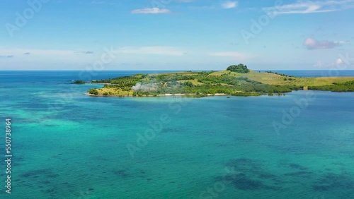 Basot Island, Caramoan , Philippines.Tropical island with green hills, aerial drone. Summer and travel vacation concept. photo