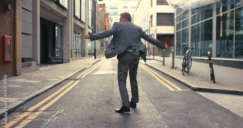 City, celebration and businessman dancing street in suit, excited energy and happy with achievement. Music, dance and corporate business man in road, urban success and celebrate startup deal or goal.